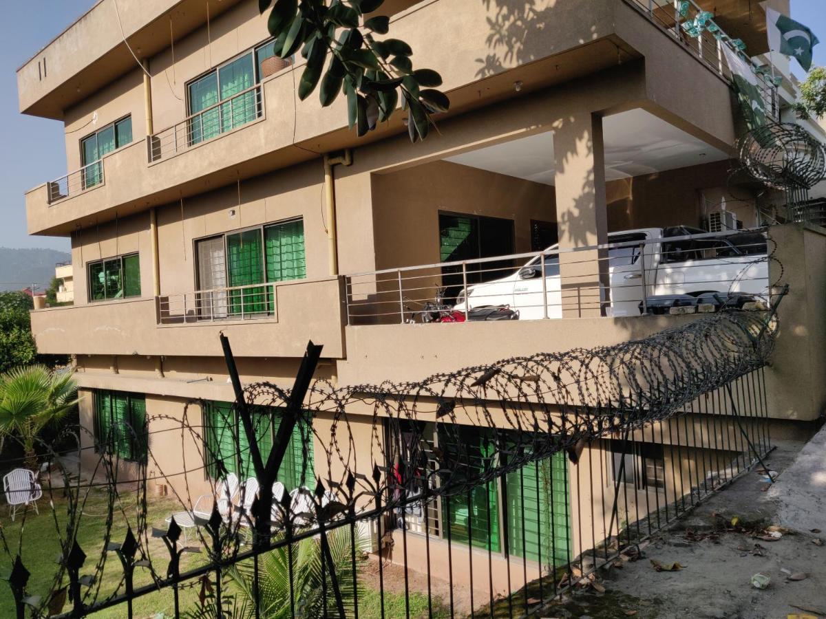 The Travelers Den Hotell Islamabad Eksteriør bilde