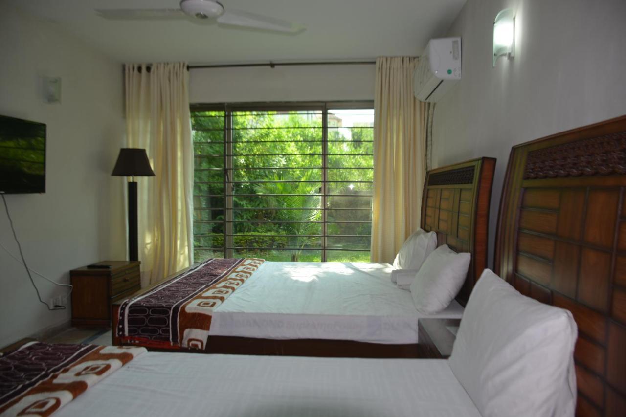The Travelers Den Hotell Islamabad Eksteriør bilde