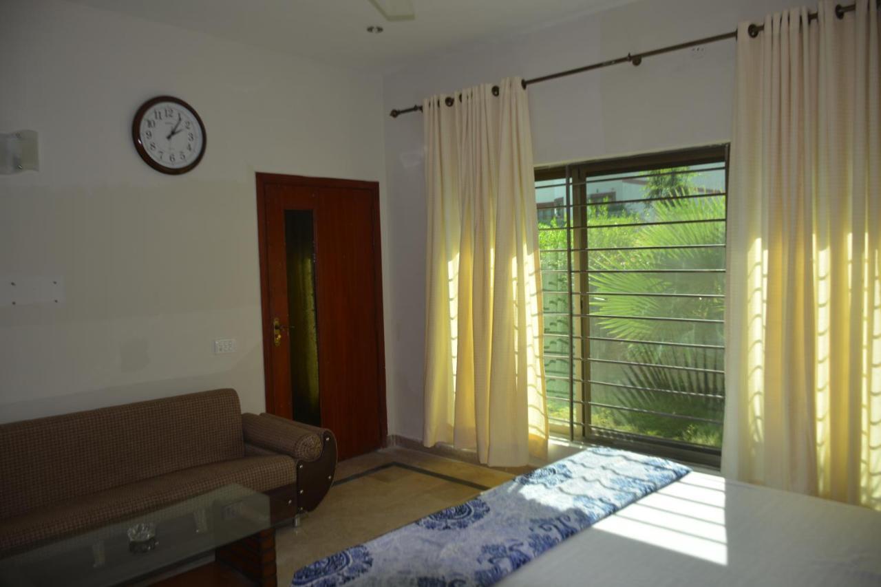 The Travelers Den Hotell Islamabad Eksteriør bilde