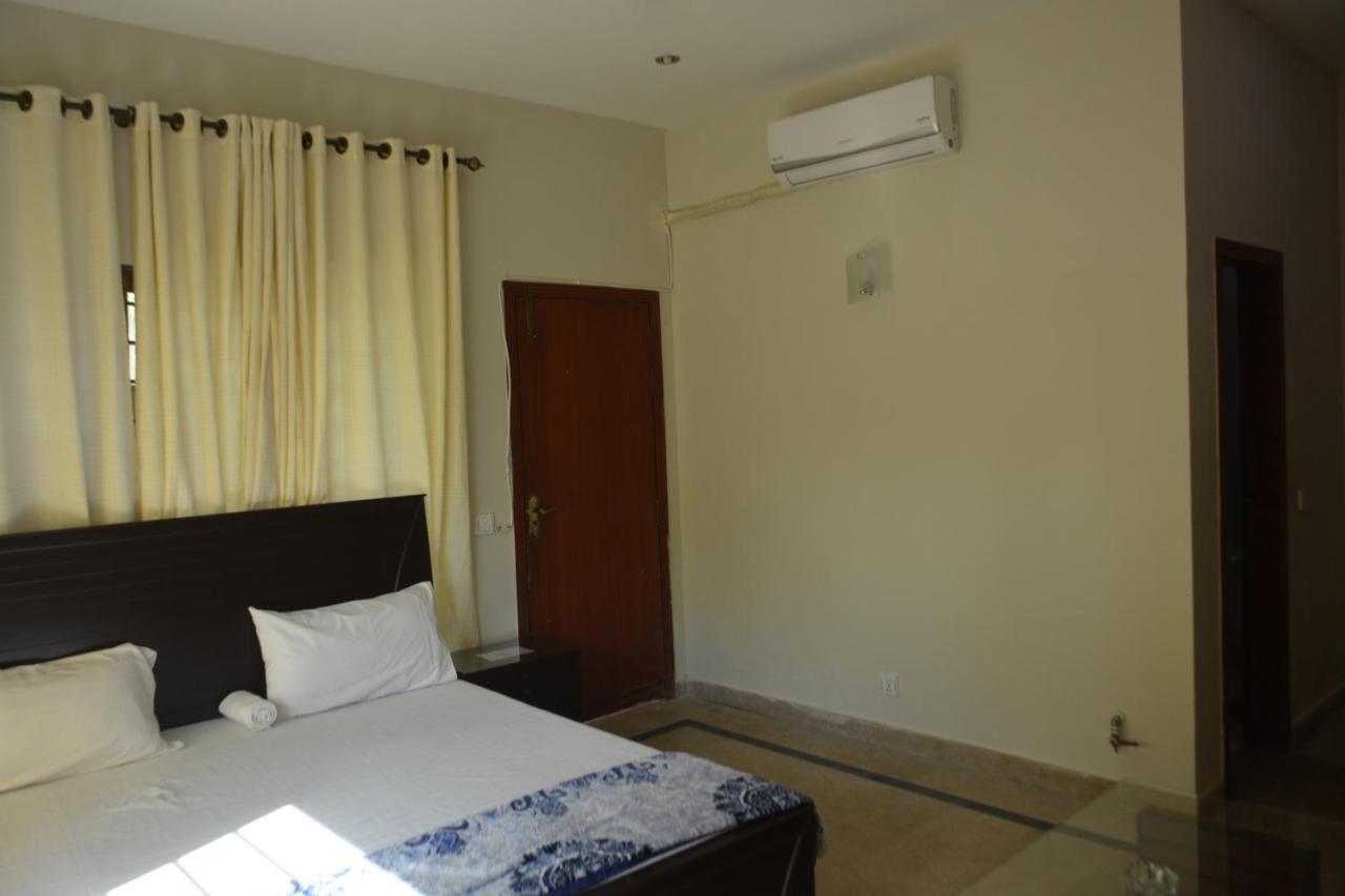 The Travelers Den Hotell Islamabad Eksteriør bilde