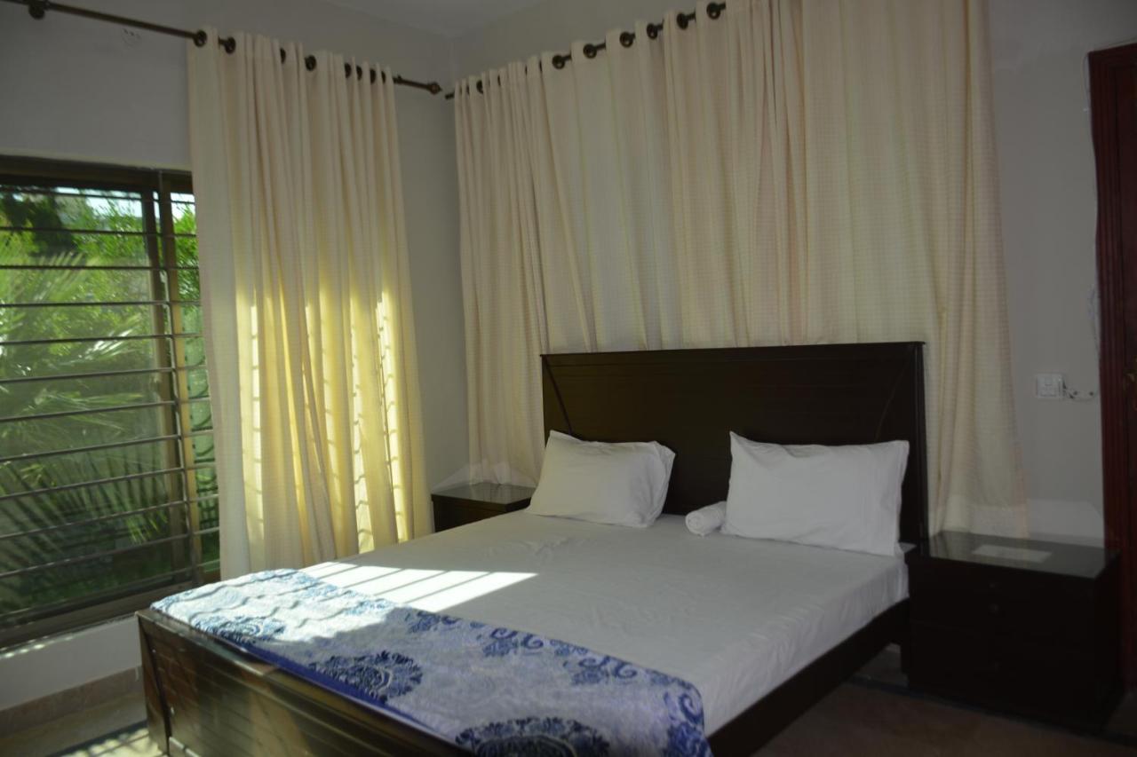 The Travelers Den Hotell Islamabad Eksteriør bilde