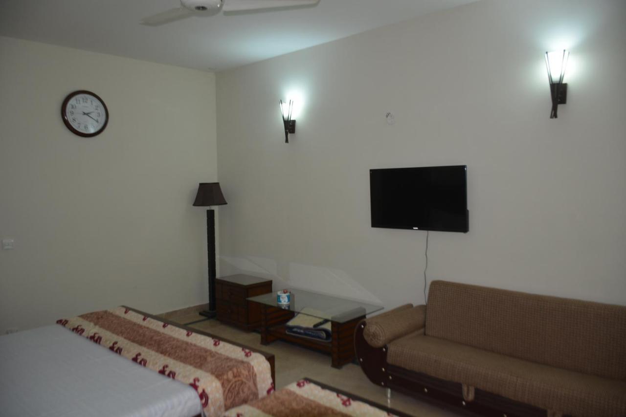 The Travelers Den Hotell Islamabad Eksteriør bilde