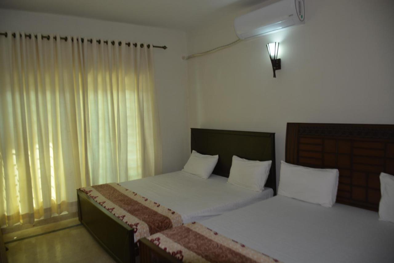 The Travelers Den Hotell Islamabad Eksteriør bilde