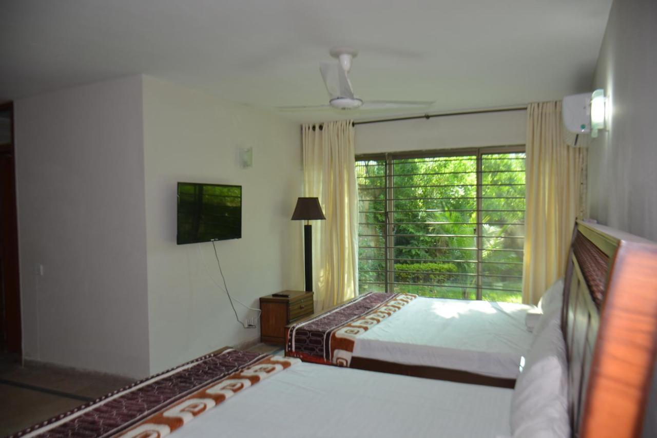 The Travelers Den Hotell Islamabad Eksteriør bilde