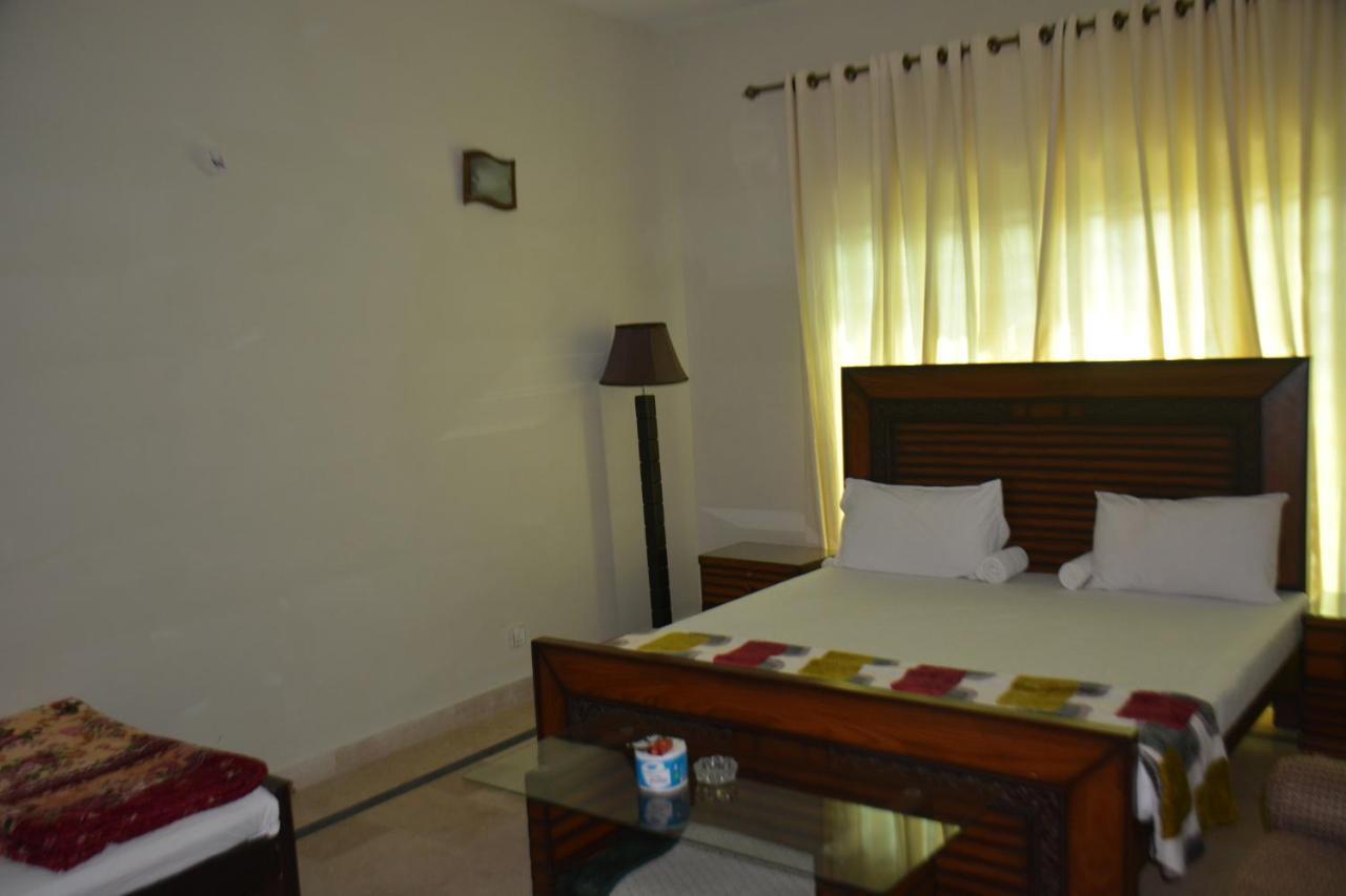 The Travelers Den Hotell Islamabad Eksteriør bilde