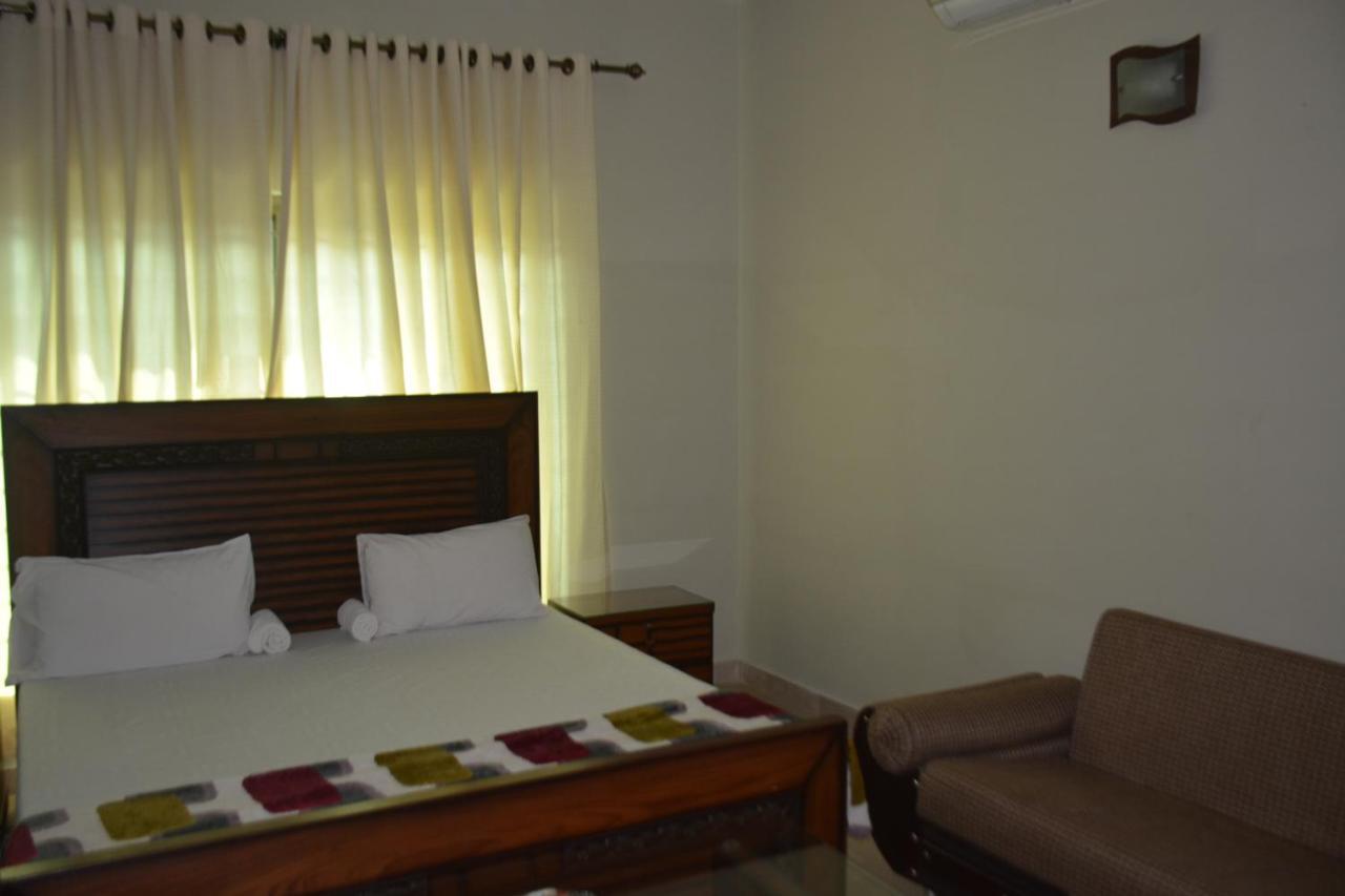 The Travelers Den Hotell Islamabad Eksteriør bilde